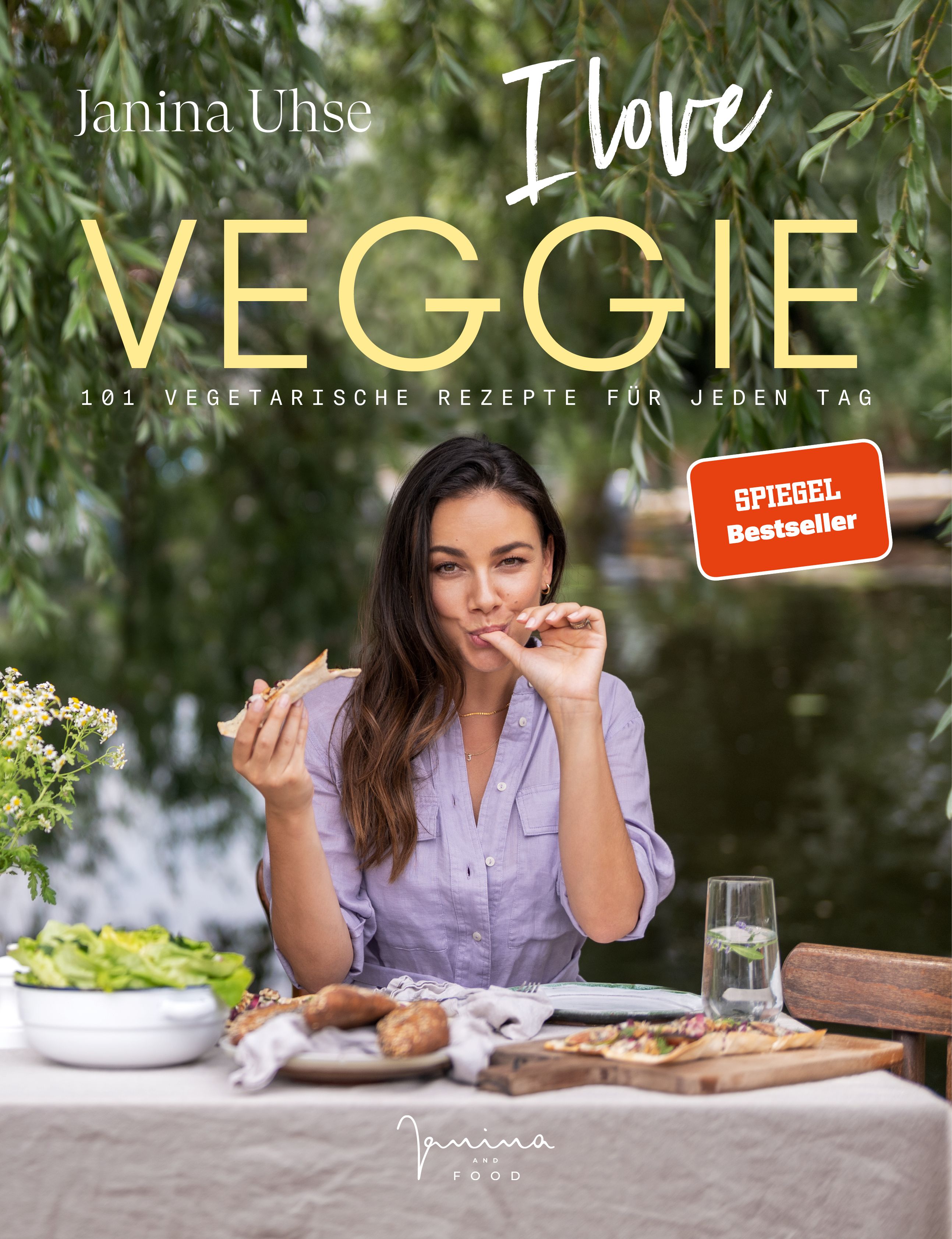 Buchcover mit Titel "I love Veggie" und Autorin Janina Uhse. Aufkleber "Spiegel Bestseller". Frau isst Brot.