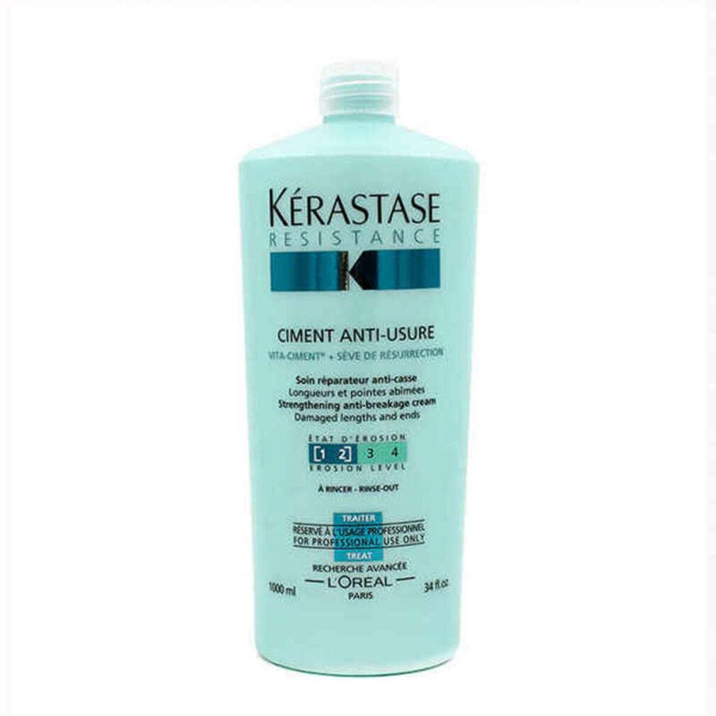Kerastase Resistance Ciment Anti-Usure Cream. Hellblaue Flasche mit weißem Deckel. Produktname und Logo sichtbar.