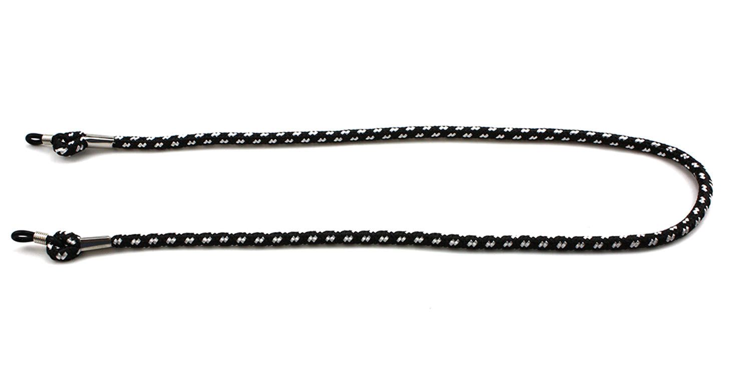 Brillenband, schwarz-weiß gemustert. Mit Schlaufen zur Befestigung an Brillenbügeln. Metallverbindungen.