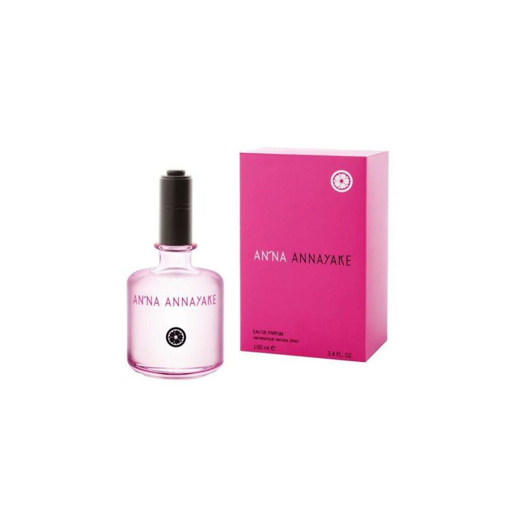 Parfümflasche und Verpackung. Flasche mit schwarzem Verschluss, rosa Flüssigkeit. Rosa Verpackung mit weißem Logo und Schriftzug.