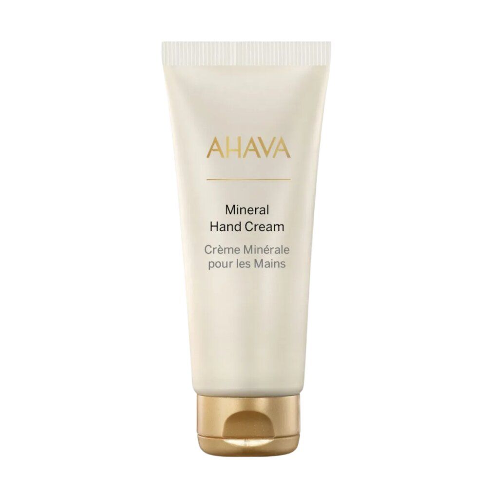 Creme-Tube mit AHAVA-Logo. Aufschrift: Mineral Hand Cream, Crème Minérale pour les Mains.