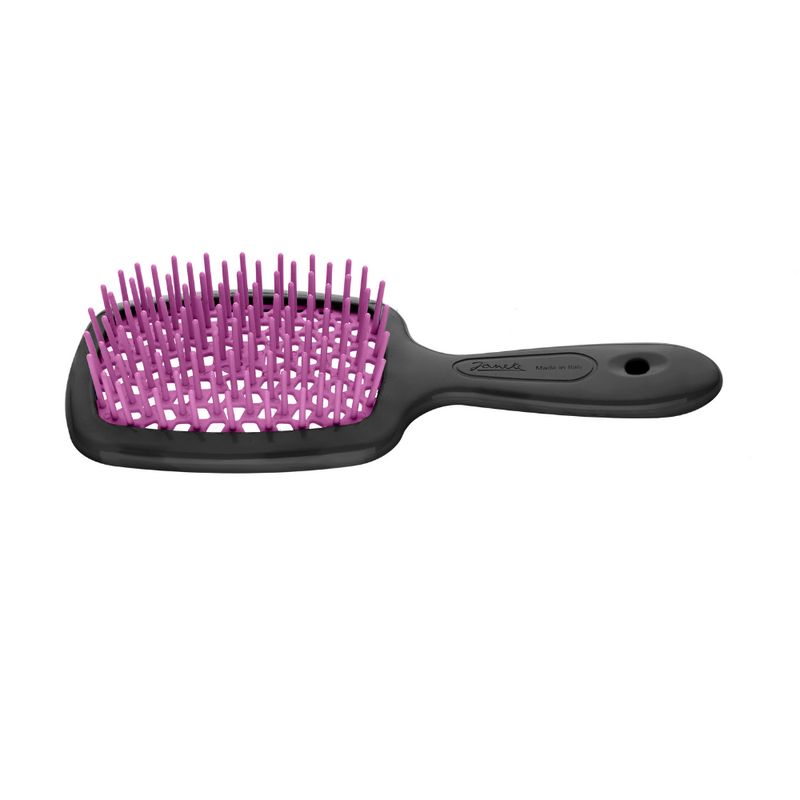 Schwarze Haarbürste mit pinkfarbenen Borsten. Griff mit Loch. Marke Janeke.