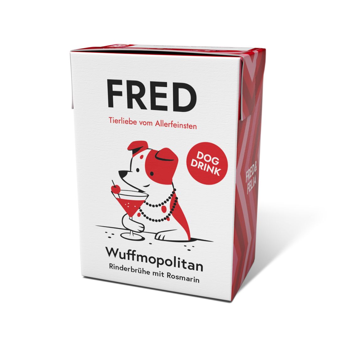 Karton mit "FRED Dog Drink Wuffmopolitan". Rote und weiße Verpackung. Logo: Hund mit Cocktailglas. Text: Rinderbrühe mit Rosmarin.