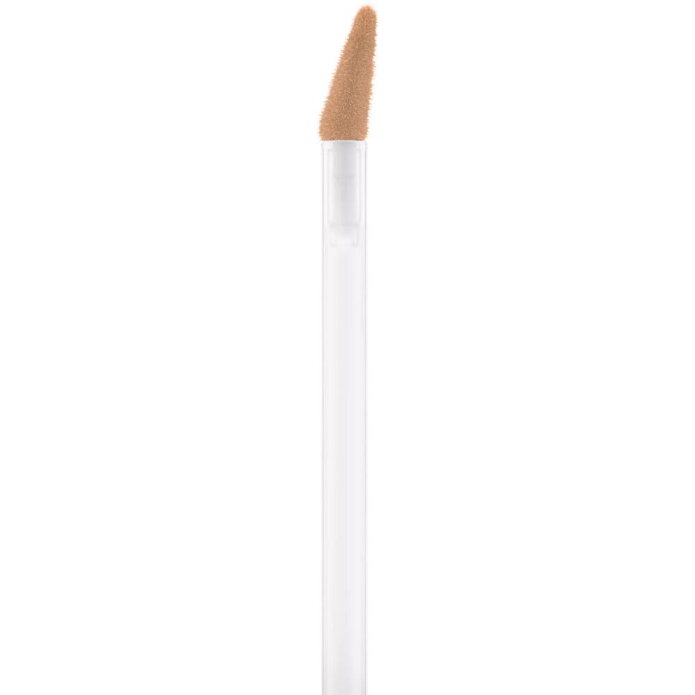 Nahaufnahme des Applikators eines Concealers. Beige Spitze, weißer Stiel.