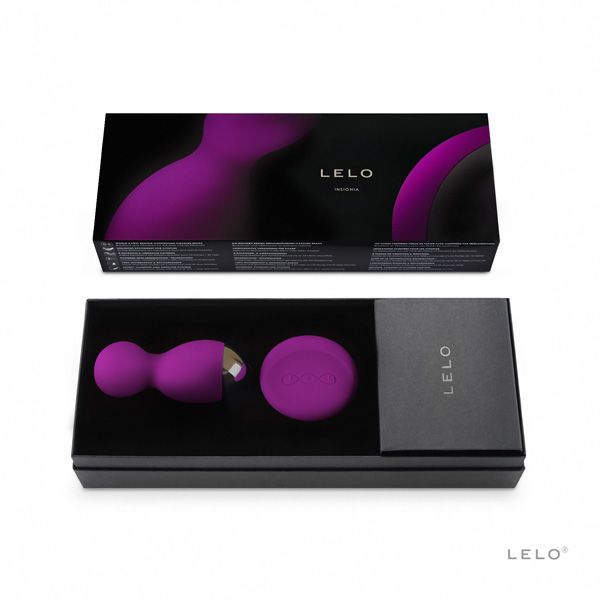 Schwarze Verpackung mit lila Vibrator und Fernbedienung. Text: LELO, HULA Beads.