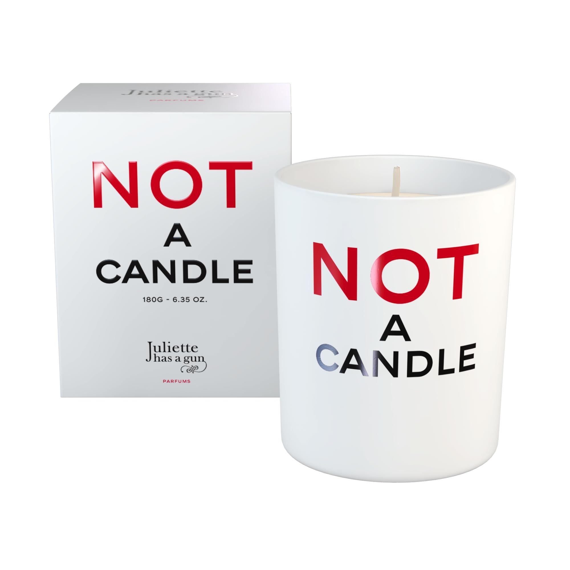 Weiße Keramikkerze mit Aufschrift 'NOT A CANDLE'. Daneben die passende weiße Verpackung.