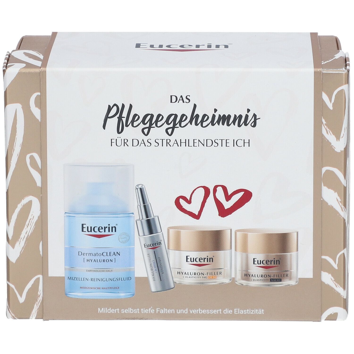 Eucerin Geschenkset mit Flasche, Serum und Cremes. Aufschrift: Das Pflegegeheimnis. Produkte auf cremefarbenem Hintergrund.