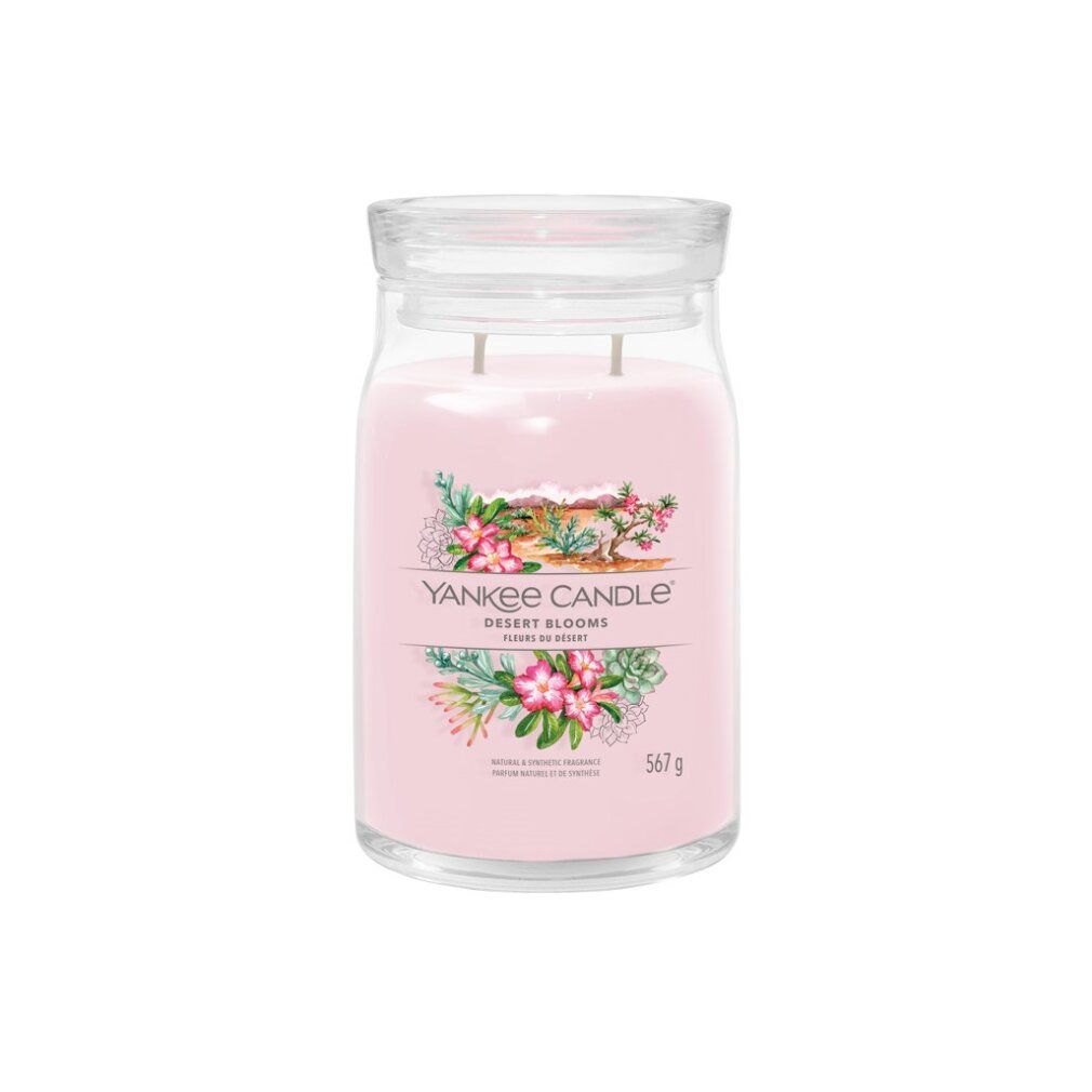 Große Kerze im Glas mit Deckel. Rosa Wachs, zwei Dochte. Aufdruck mit Blumenmotiv und Schriftzug Yankee Candle Desert Blooms.