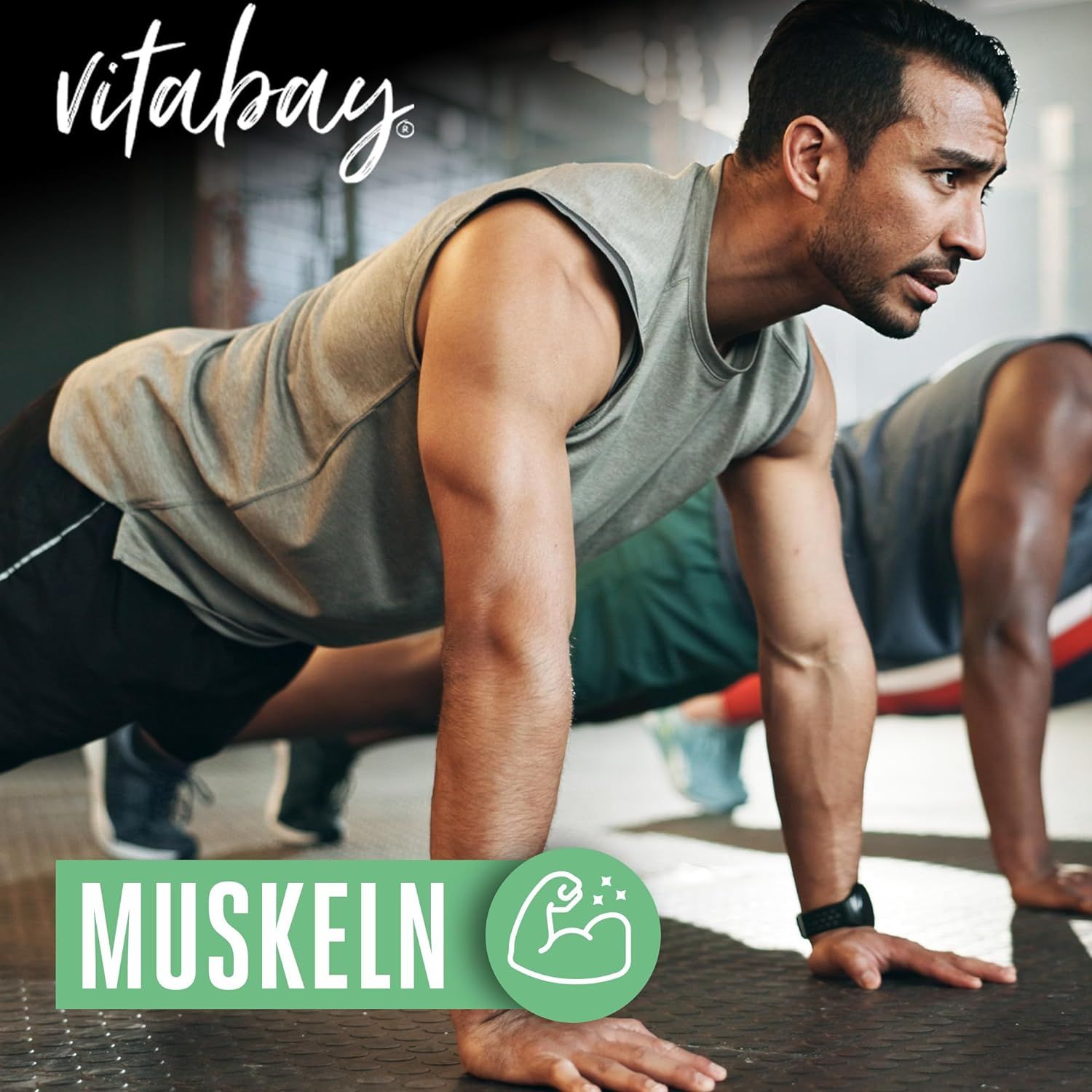 Männer machen Liegestütze im Fitnessstudio. Vitabay L-Taurin: Muskeln.