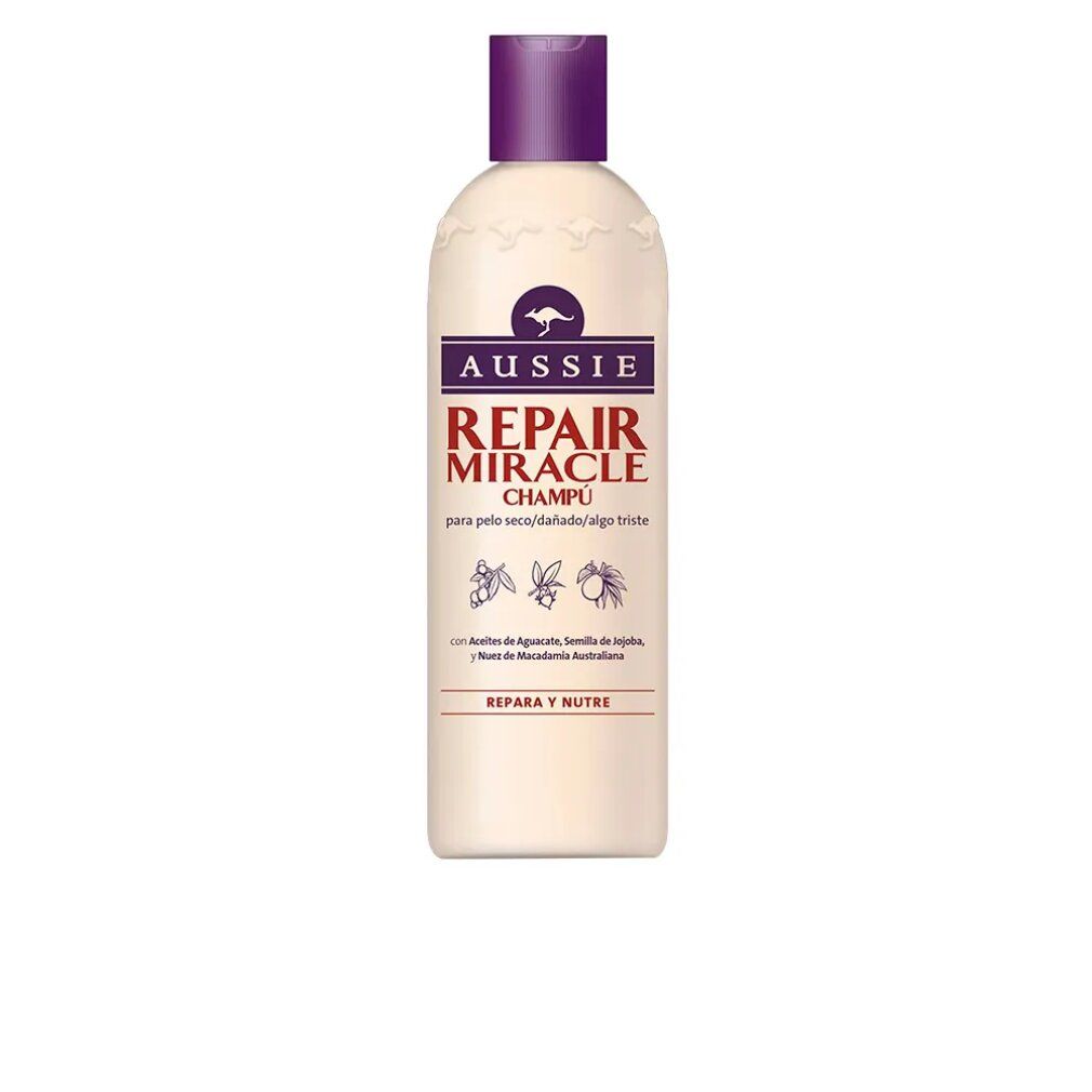 Beige Shampoo-Flasche mit lila Deckel. Aufschrift: Aussie Repair Miracle Champú. Mit Känguru-Logo.