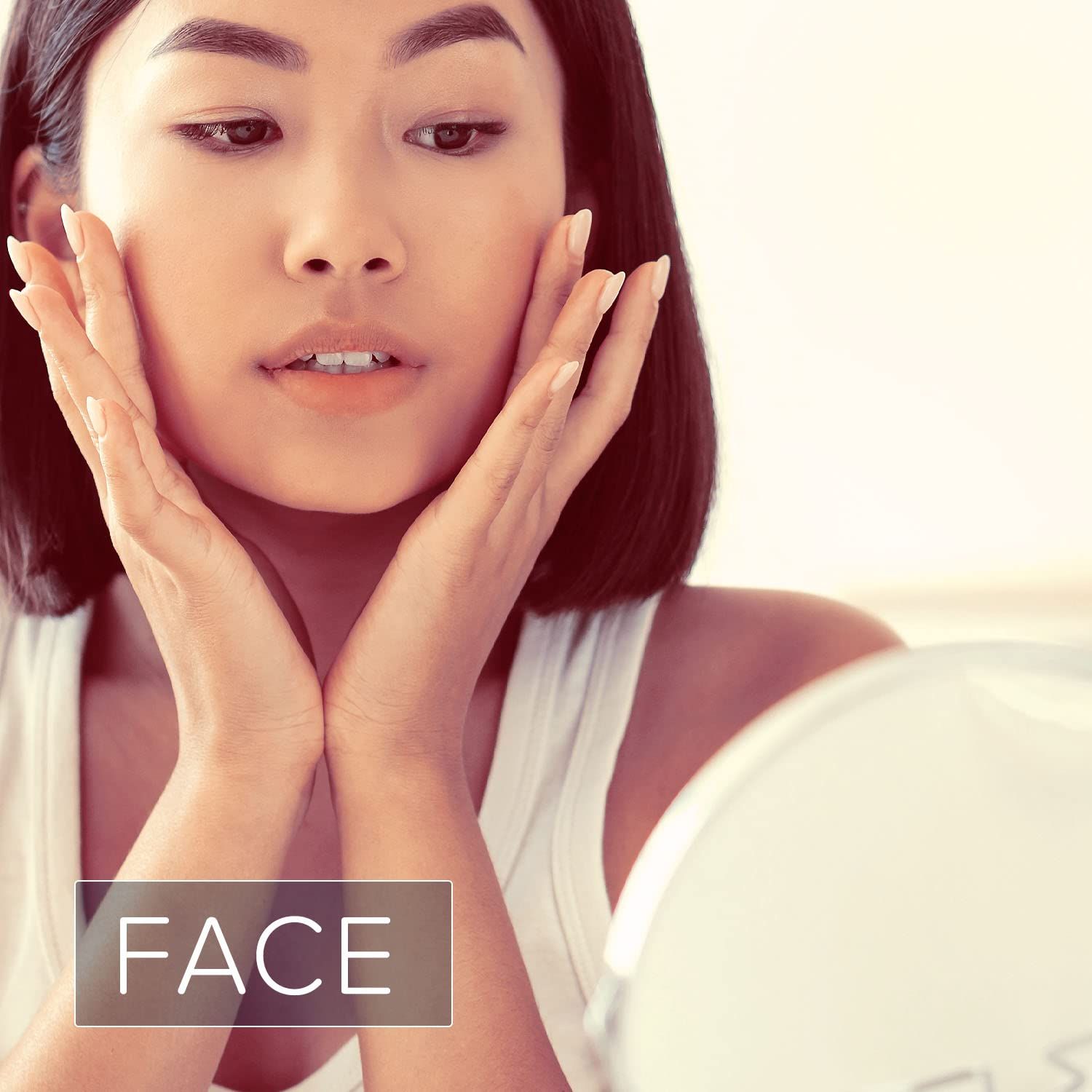 Frau berührt Gesicht. Text: FACE.
