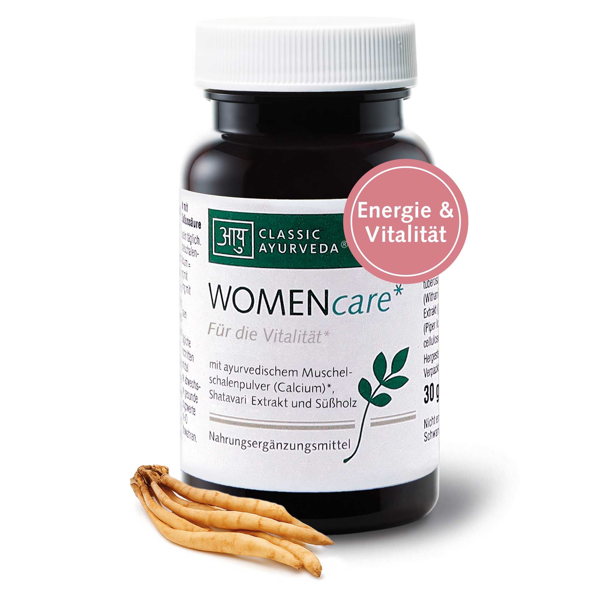 Braune Tablettenflasche mit weißem Deckel. Aufschrift: WOMENcare*. Classic Ayurveda Logo. Text: Energie & Vitalität. Wurzeln daneben.