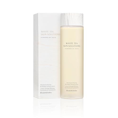 Flasche und Verpackung. Aufschrift: White Tea Skin Solutions. Lotion-Text. Weißer Deckel.