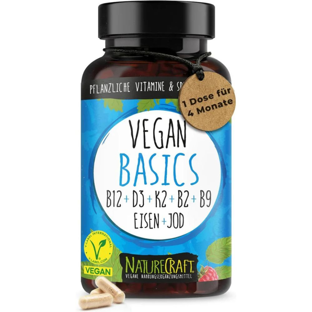 Braune Flasche mit schwarzen Deckel. Aufkleber mit "Vegan Basics" und Inhaltsstoffen. Braune Kapseln liegen davor.