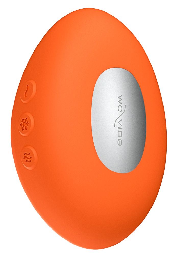 Orangefarbenes, ovales Gerät mit drei Knöpfen und einem silbernen Bereich mit "we vibe"-Logo. Die Oberfläche ist glatt.