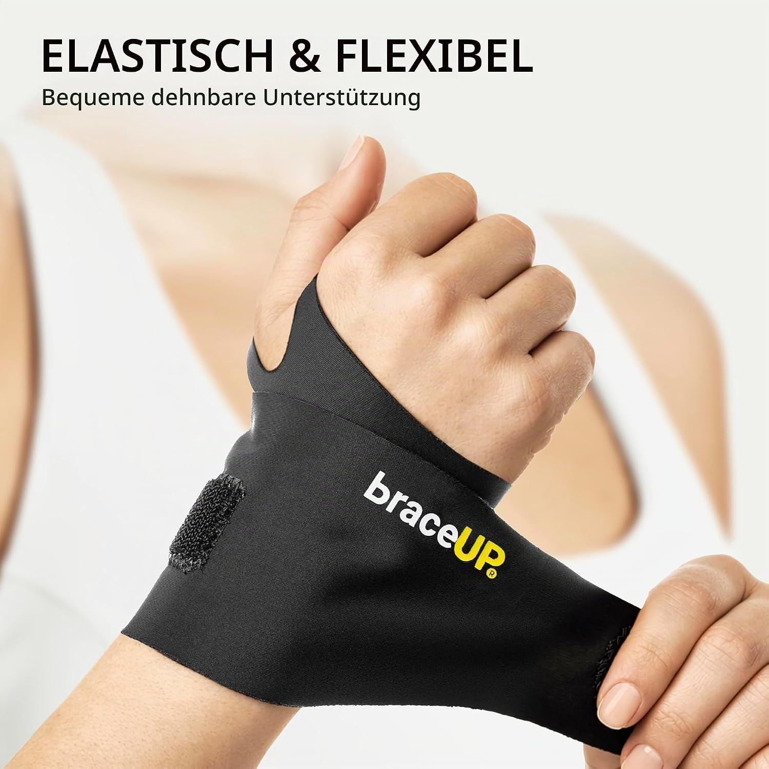 Schwarze, elastische Handgelenkbandage mit Klettverschluss und gelbem Logo 'braceUP'.