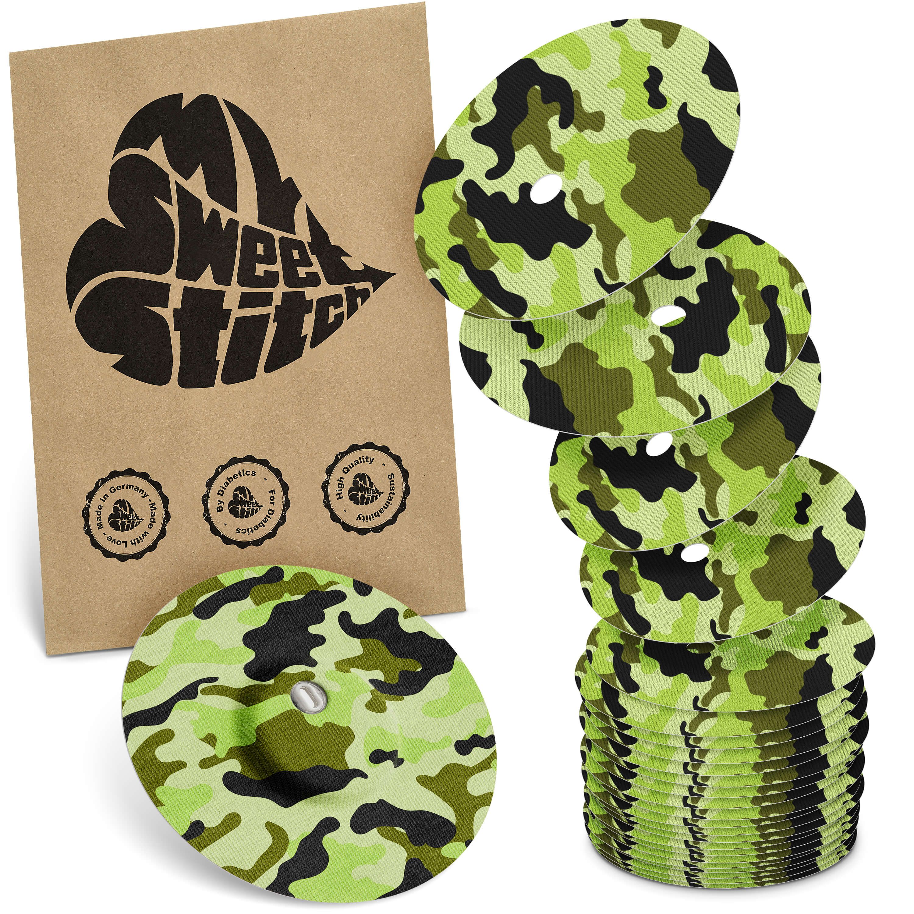 Runde Pflaster mit Camouflage-Muster, braune Verpackung mit Logo und Qualitätszeichen.