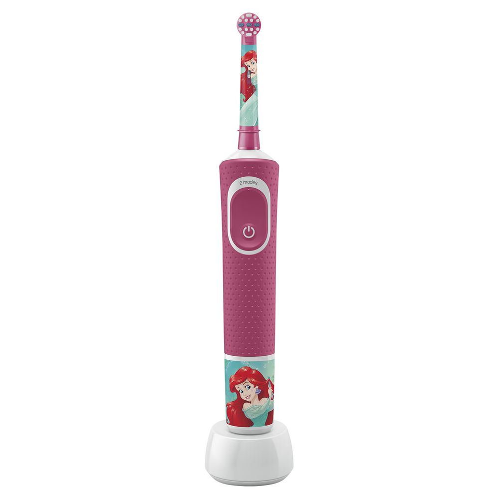Elektrische Zahnbürste, pink, mit Ariel-Motiv. Auf Ladestation. Griff mit Ein-/Ausschalter und Ariel-Dekor.