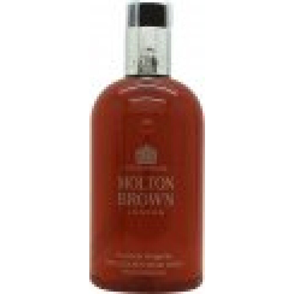 Runde, braune Flasche mit silbernem Verschluss. Aufschrift: Molton Brown London. Produktname und Logo.