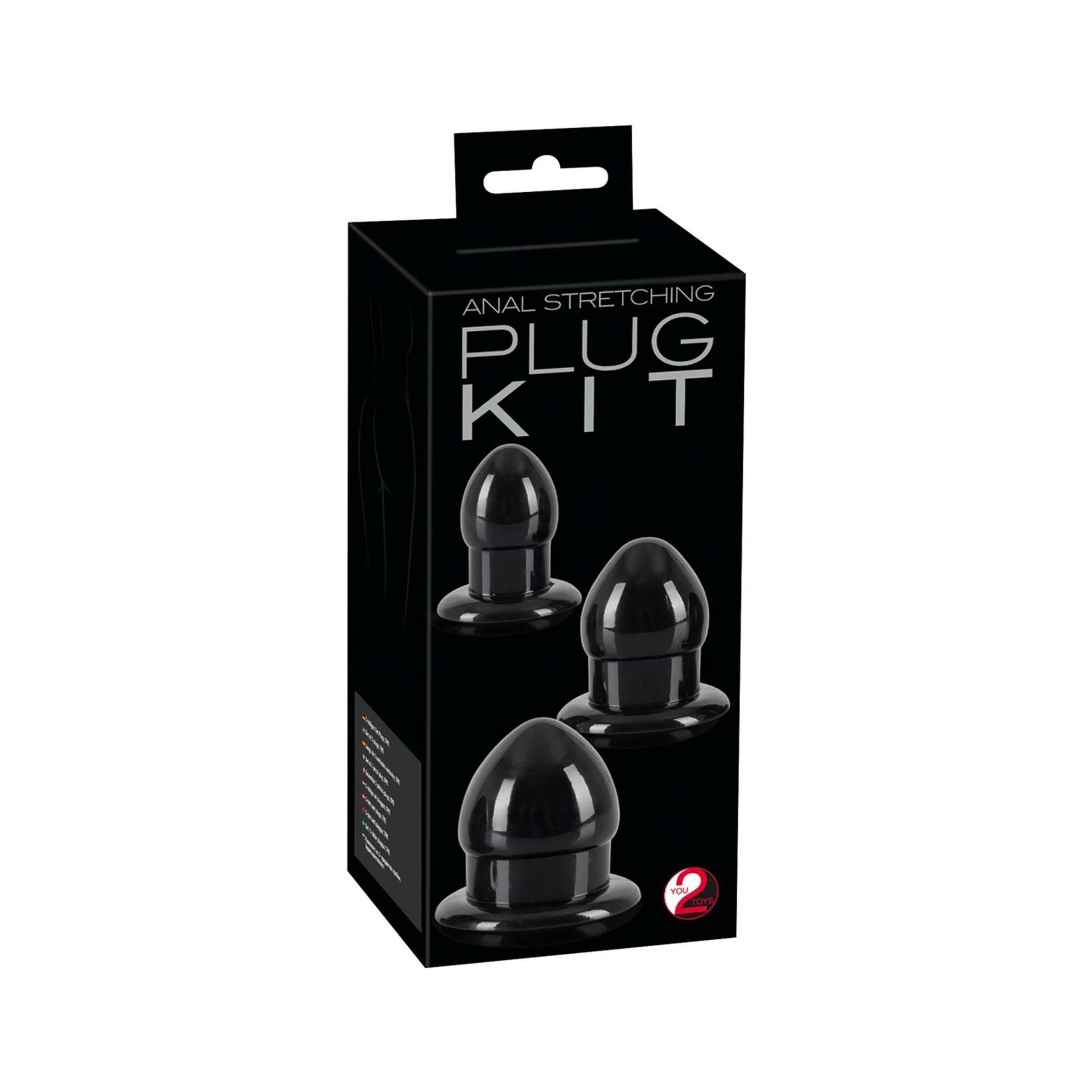 Schwarze Plug Kit Verpackung. Text: ANAL STRETCHING PLUG KIT. Drei schwarze Anal-Stretching-Plugs sind abgebildet.