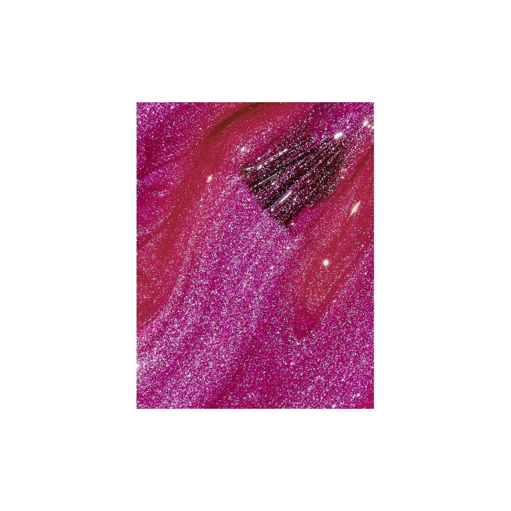 Nagellack-Farbmuster in Rosa- und Lilatönen mit Glitzer. Der Pinsel ist sichtbar.