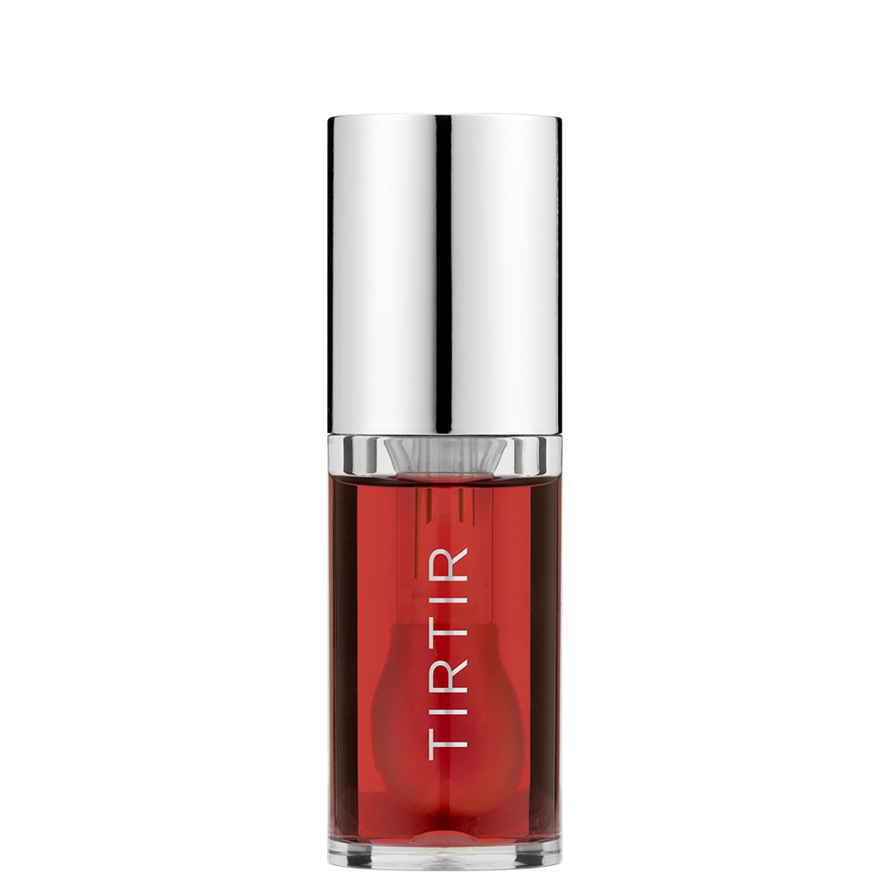 TIR TIR My Glow Lip Oil Rosy in einem transparenten Fläschchen mit silbernem Deckel.