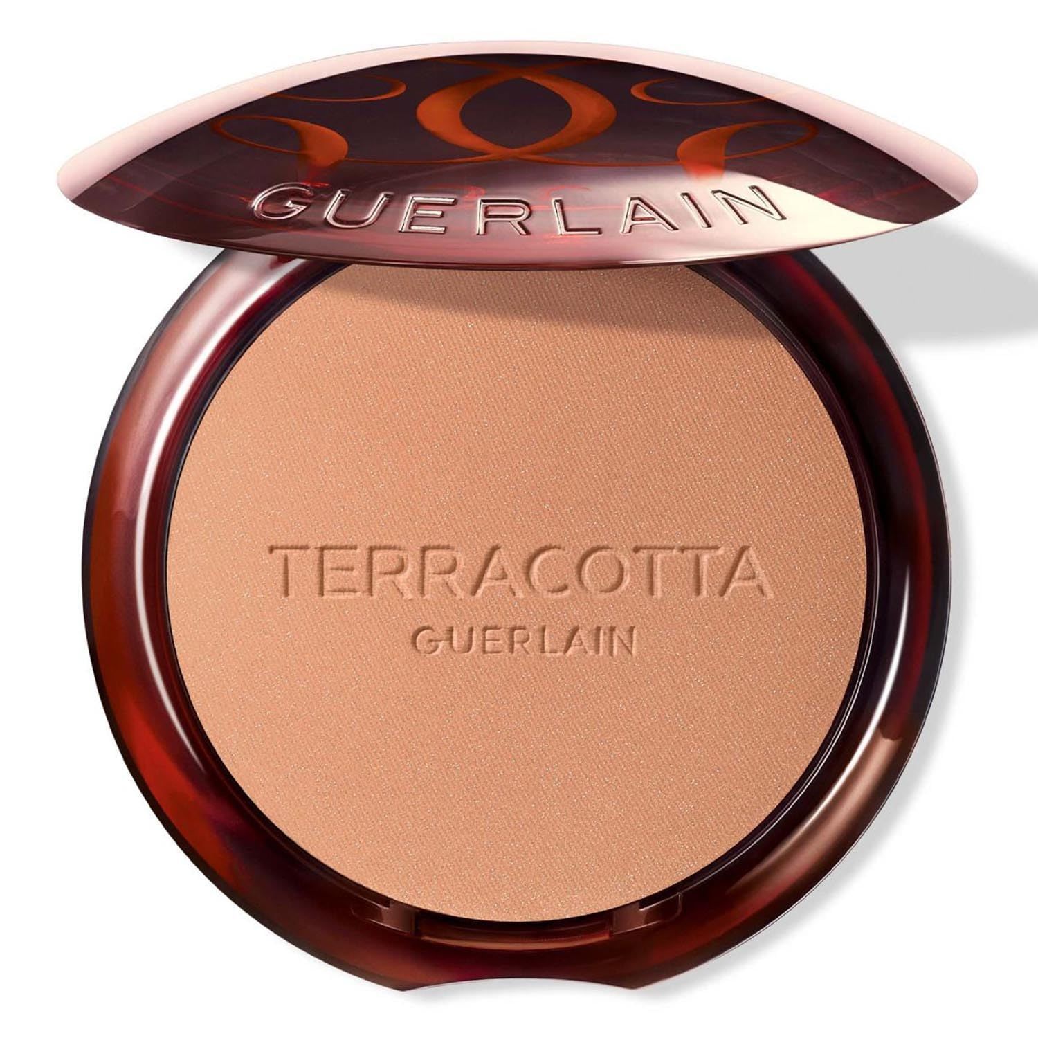 Runder, brauner Kompaktpuder mit Deckel. Auf dem Puder steht "TERRACOTTA" und "GUERLAIN". Der Deckel ist geöffnet.