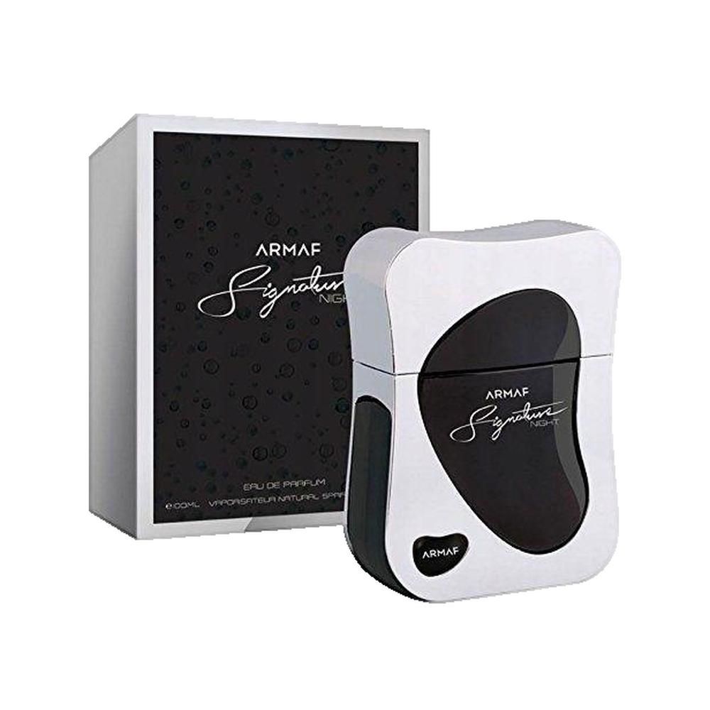 Parfumflakon und Verpackung. Flakon weiß-schwarz, rechteckig, abgerundet. Verpackung schwarz-weiß, Schriftzug.