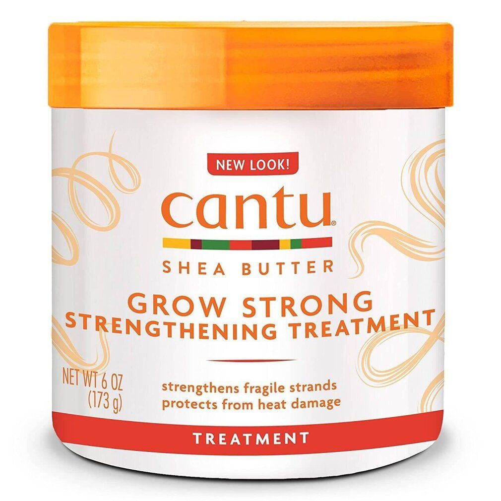 Cantu Shea Butter Grow Strong Treatment. Weißes Gefäß mit orangefarbenem Deckel. Text: Grow Strong, Shea Butter, 173g, New Look!