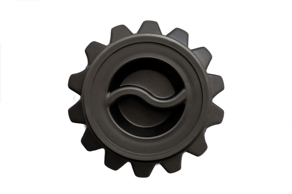 Schwarzer Rollen-Ende mit Zahnrad-Design und Griffmulde.