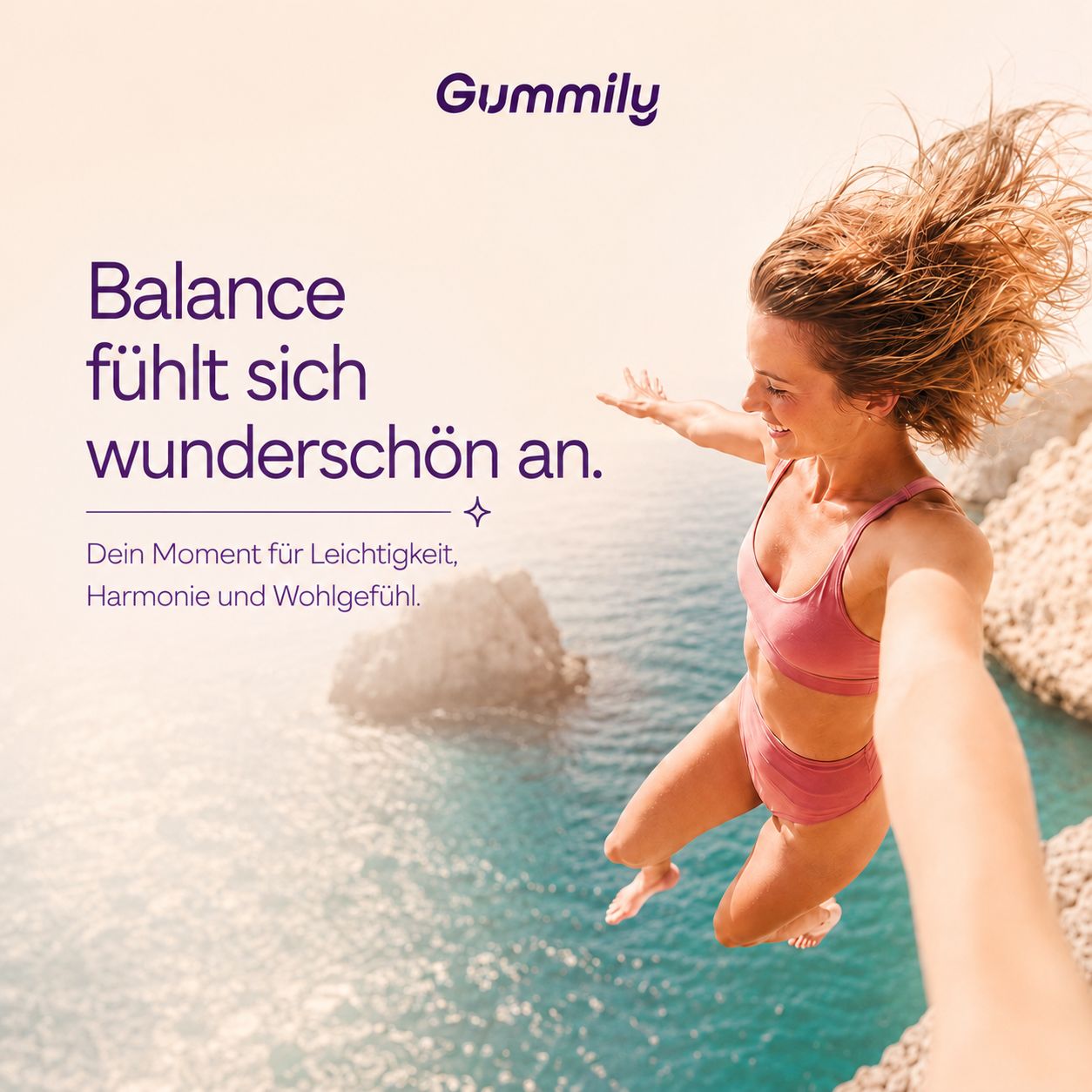 Frau springt ins Meer, "Balance fühlt sich wunderschön an".