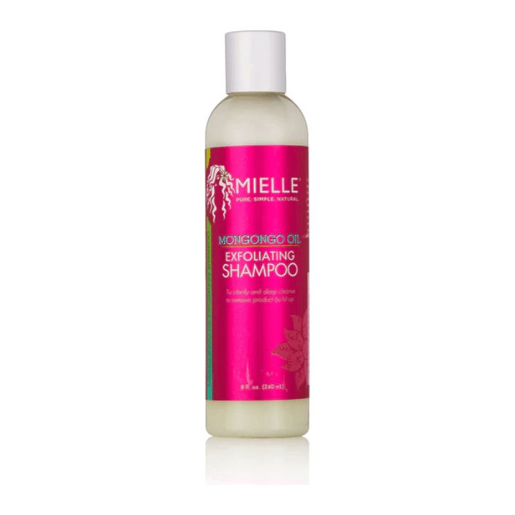 Flasche Mielle Mongongo Öl Peeling Shampoo. Weißer Deckel, pinkfarbenes Etikett mit Produktnamen und Logo.
