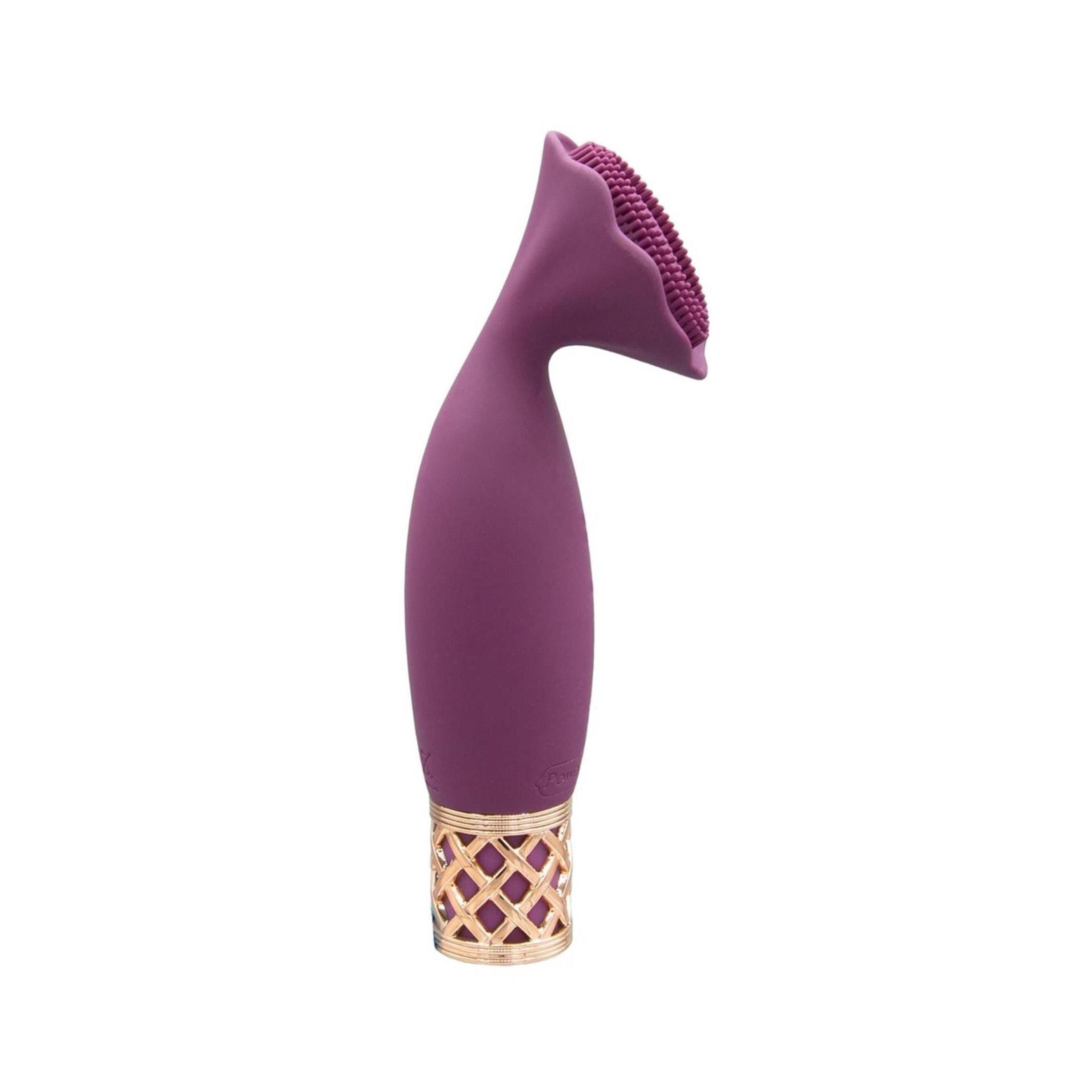 Lila Vibrator mit goldfarbenem Gittermuster am Griff. Oben ein blütenförmiger Aufsatz.
