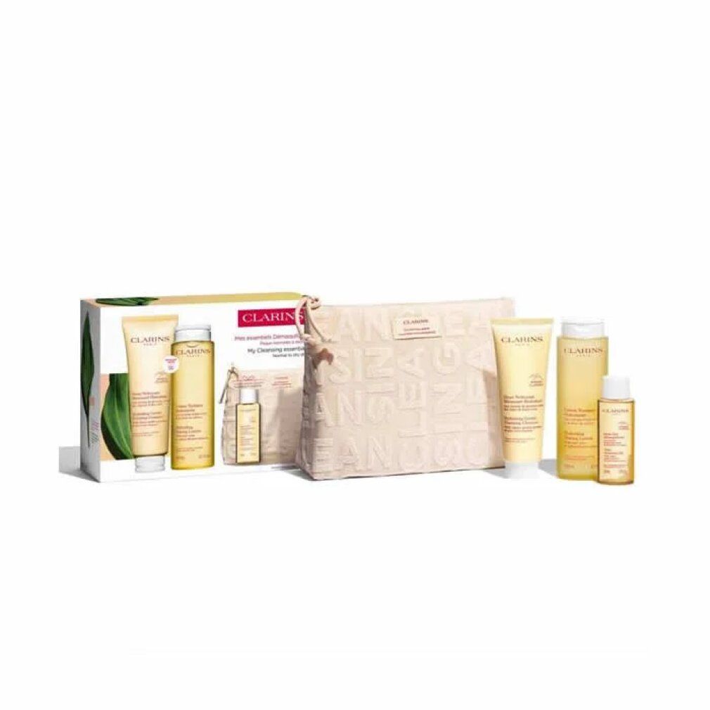 Geschenkset mit Hautpflegeprodukten. Enthält Tuben, Flaschen und eine Kosmetiktasche. Verpackung mit Logo.