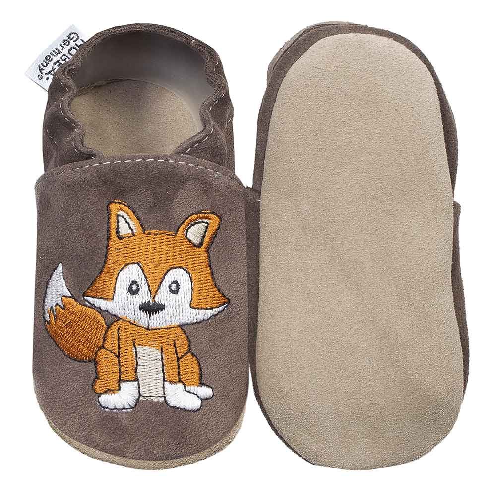 Kinderschuh, dunkelbraun, Fuchsmotiv. HOBEA-Germany Label. Einzelner Schuh, Sohle sichtbar.
