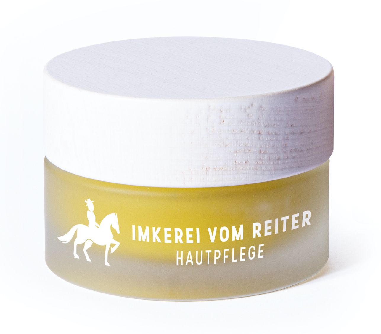 Creme-Tiegel mit weißem Deckel. Aufschrift: Imkerei vom Reiter Hautpflege. Logo: Reiter auf Pferd.