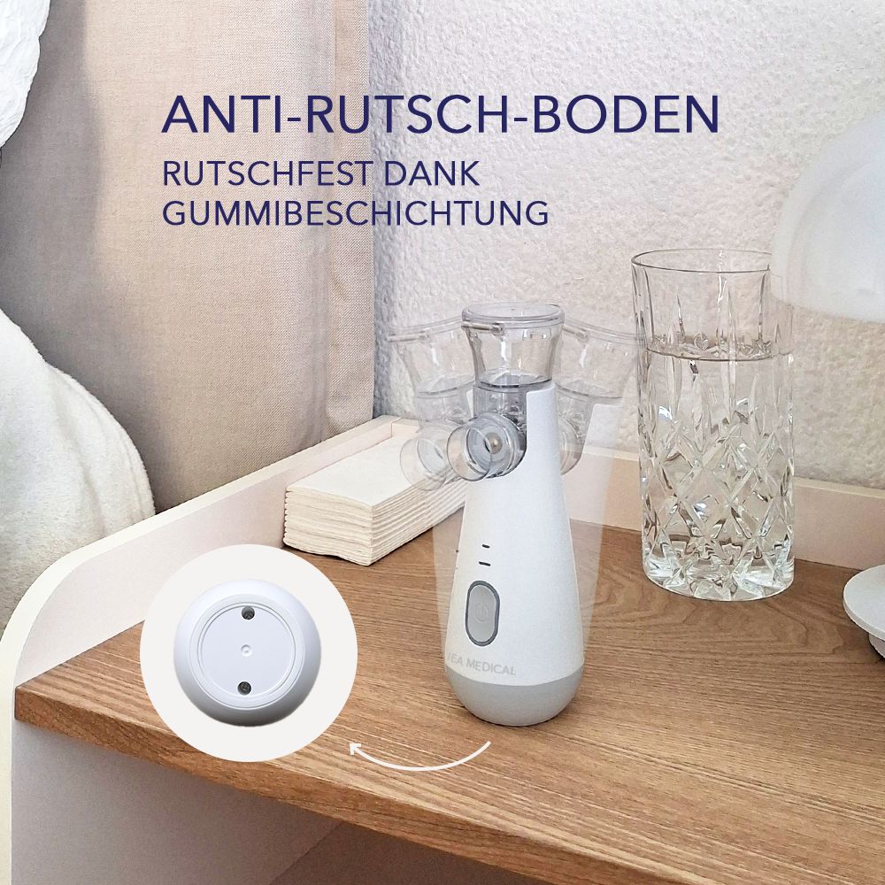 Inhalator auf Nachttisch mit rutschfestem Gummiboden.