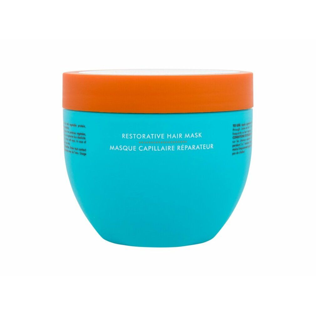 Türkisfarbene Dose mit orangefarbenem Deckel. Text: Restorative Hair Mask, Masque Capillaire Réparateur.