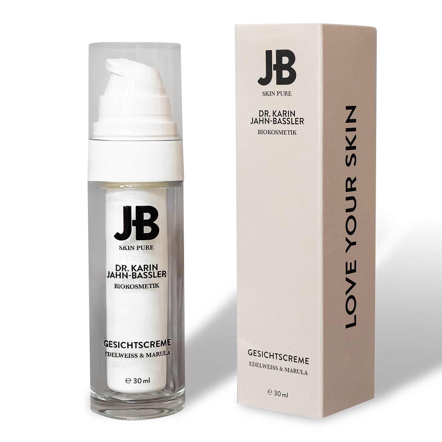 Gesichtscreme-Spender und Karton. Aufschrift: JB SKIN PURE, DR. KARIN JAHN-BASSLER, GESICHTSCREME, 30 ml. Karton mit Aufschrift: LOVE YOUR SKIN.