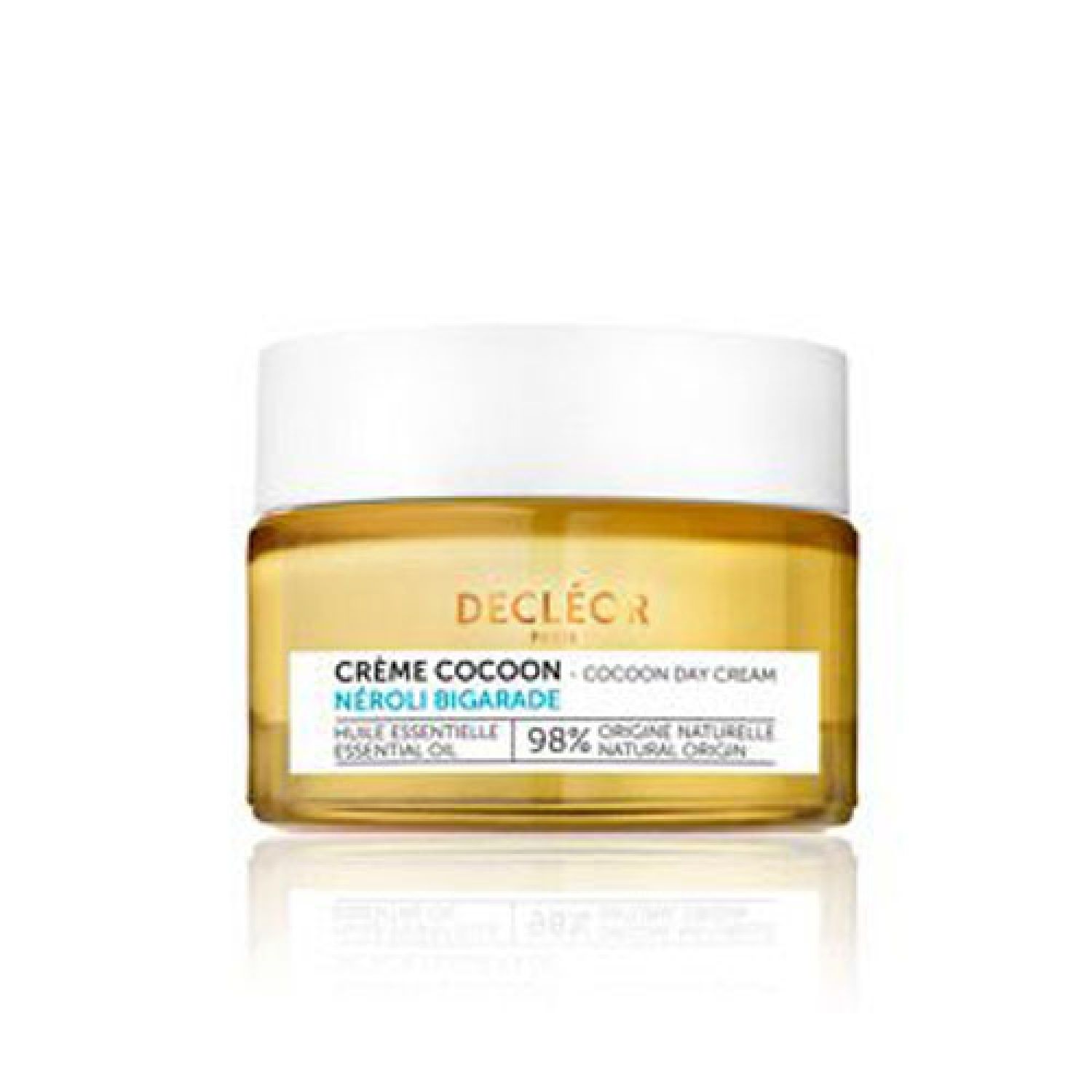 Glasbehälter mit Creme. Aufschrift: DECLÉOR, CRÈME COCOON NÉROLI BIGARADE, 98% natürliche Inhaltsstoffe.