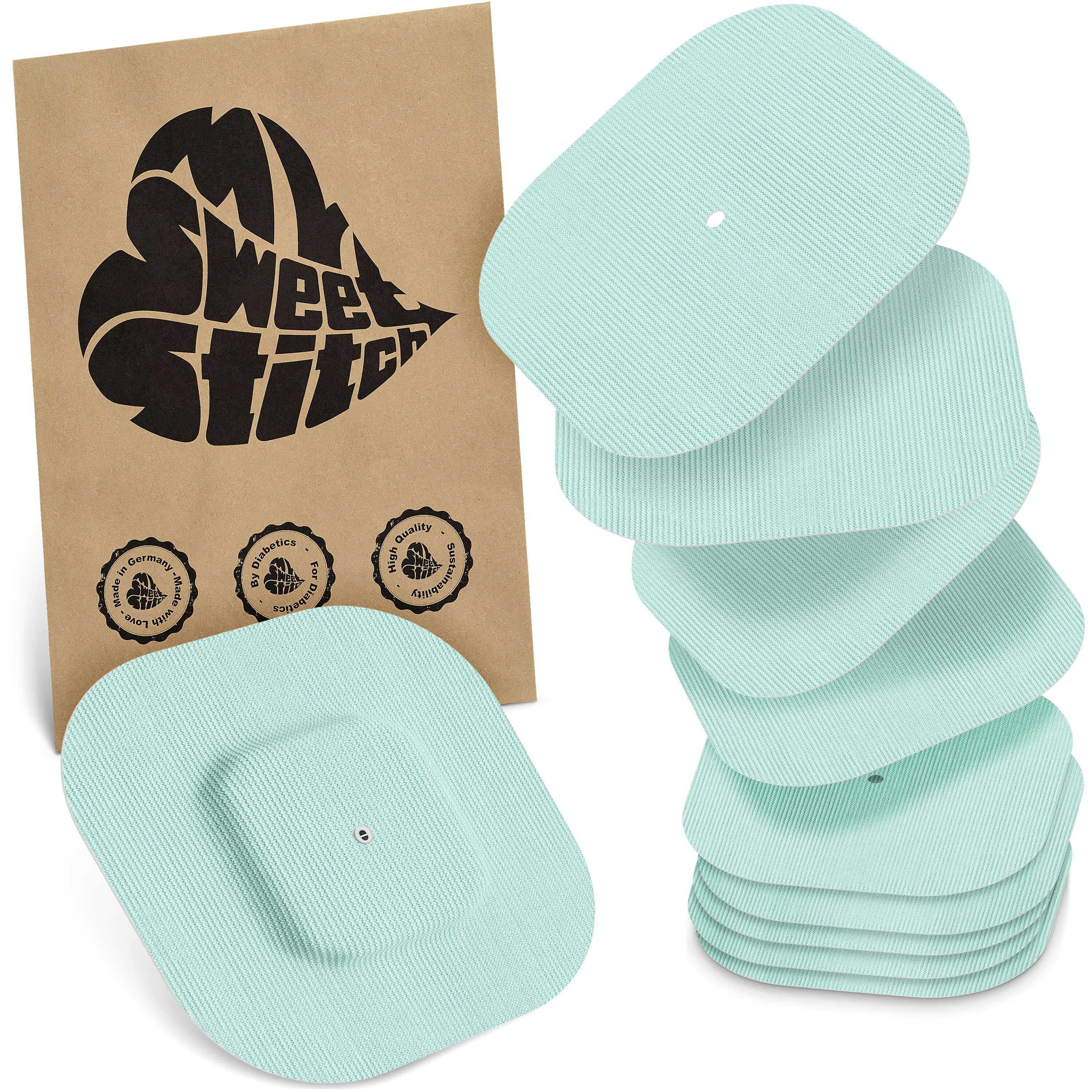Hellgrüne, quadratische Pflaster mit abgerundeten Ecken. Auf brauner Verpackung ist der Schriftzug "MySweetStitch" zu sehen.