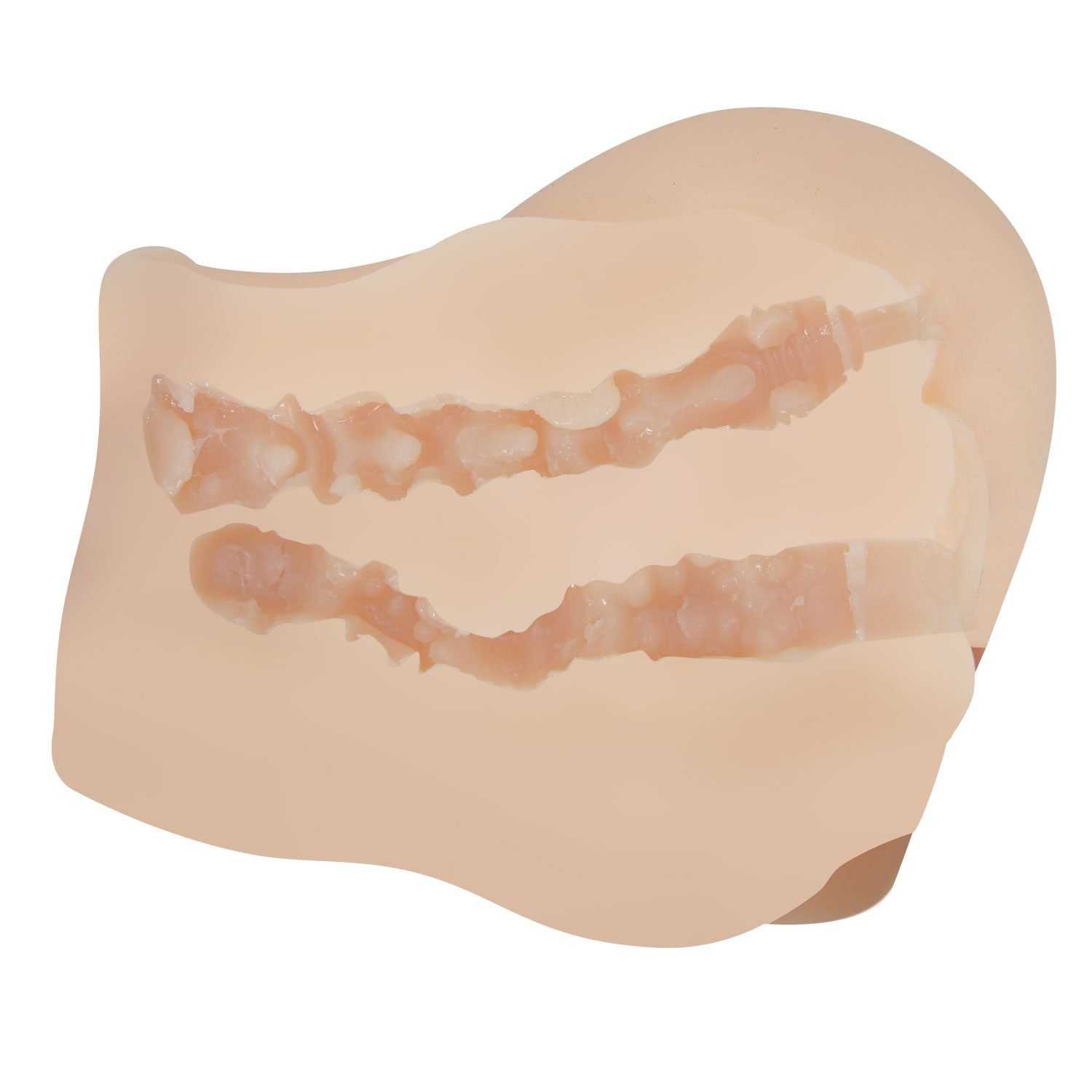 Masturbator aus hautfarbenem Material. Innere Struktur mit Rippen sichtbar.