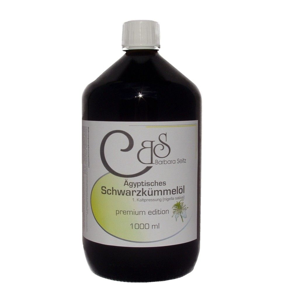 Dunkle Glasflasche mit weißem Deckel. Etikett mit Logo, Text: Ägyptisches Schwarzkümmelöl, premium edition, 1000 ml.