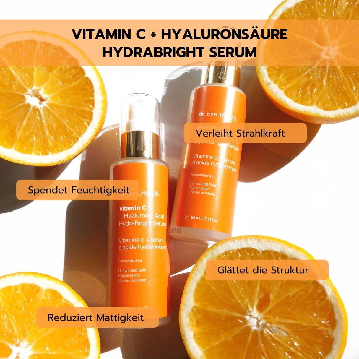 Zwei Dr. Eve Ryouth Vitamin C + Hyaluronsäure Hydrabright Serum Flakons umgeben von Orangenscheiben.