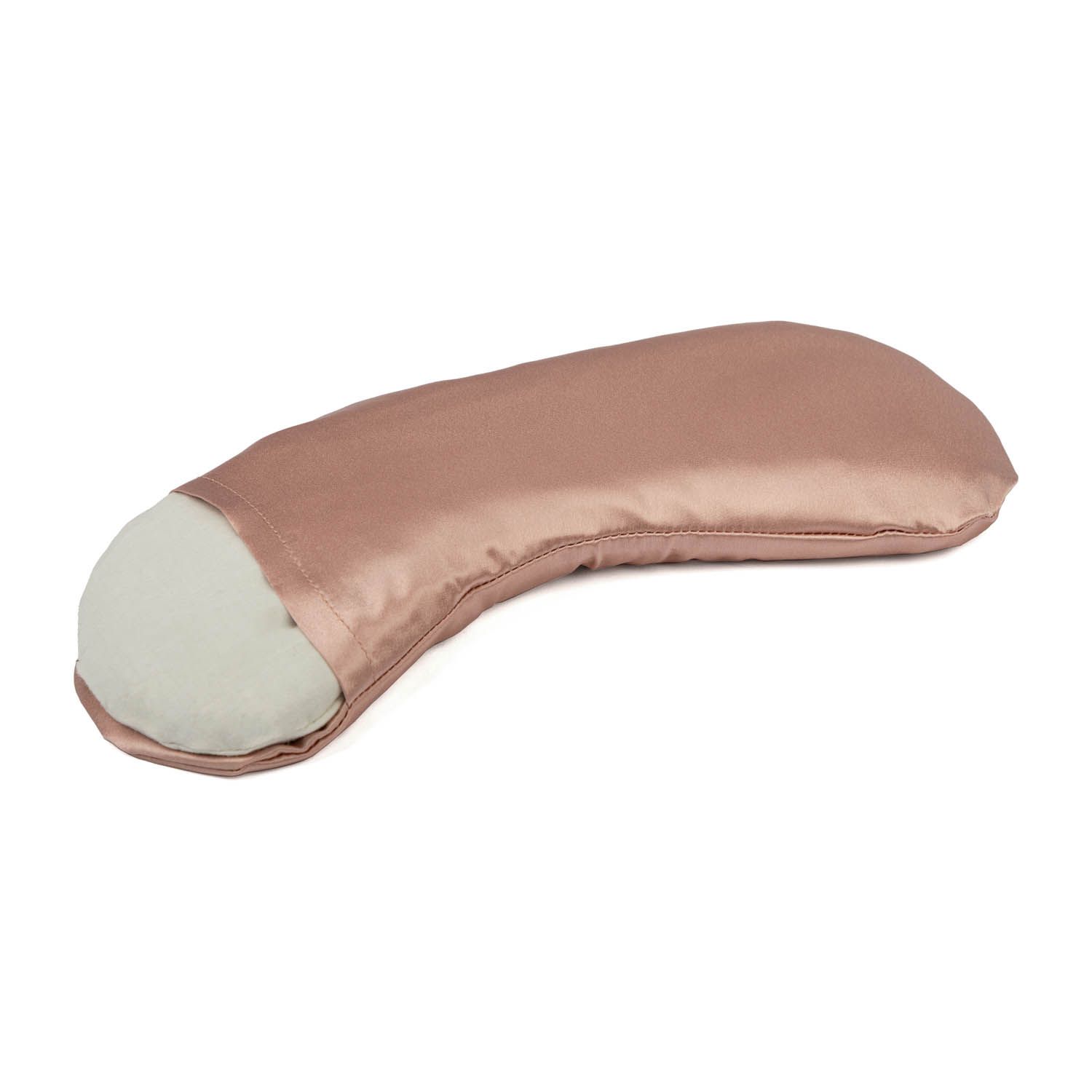 Ein rosafarbenes Augenkissen aus Satin mit einem herausnehmbaren Inlet.