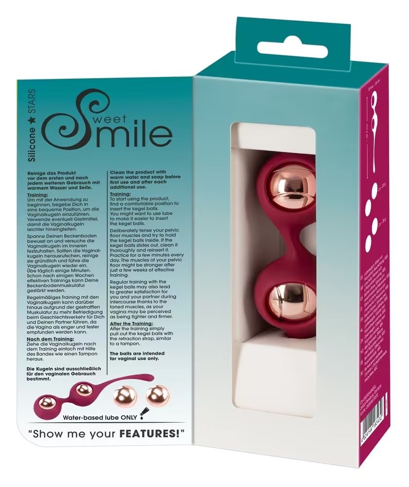 Geöffnete Verpackung mit zwei Kegel-Trainingskugeln. Text: Sweet Smile. Auf der Verpackung: Gebrauchsanweisung. Aufschrift: Water-based lube ONLY.