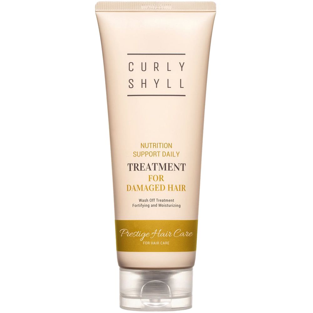 Beige Tube mit schwarzer Schrift. Aufschrift: CURLY SHYLL, TREATMENT FOR DAMAGED HAIR. Untertitel: Prestige Hair Care.