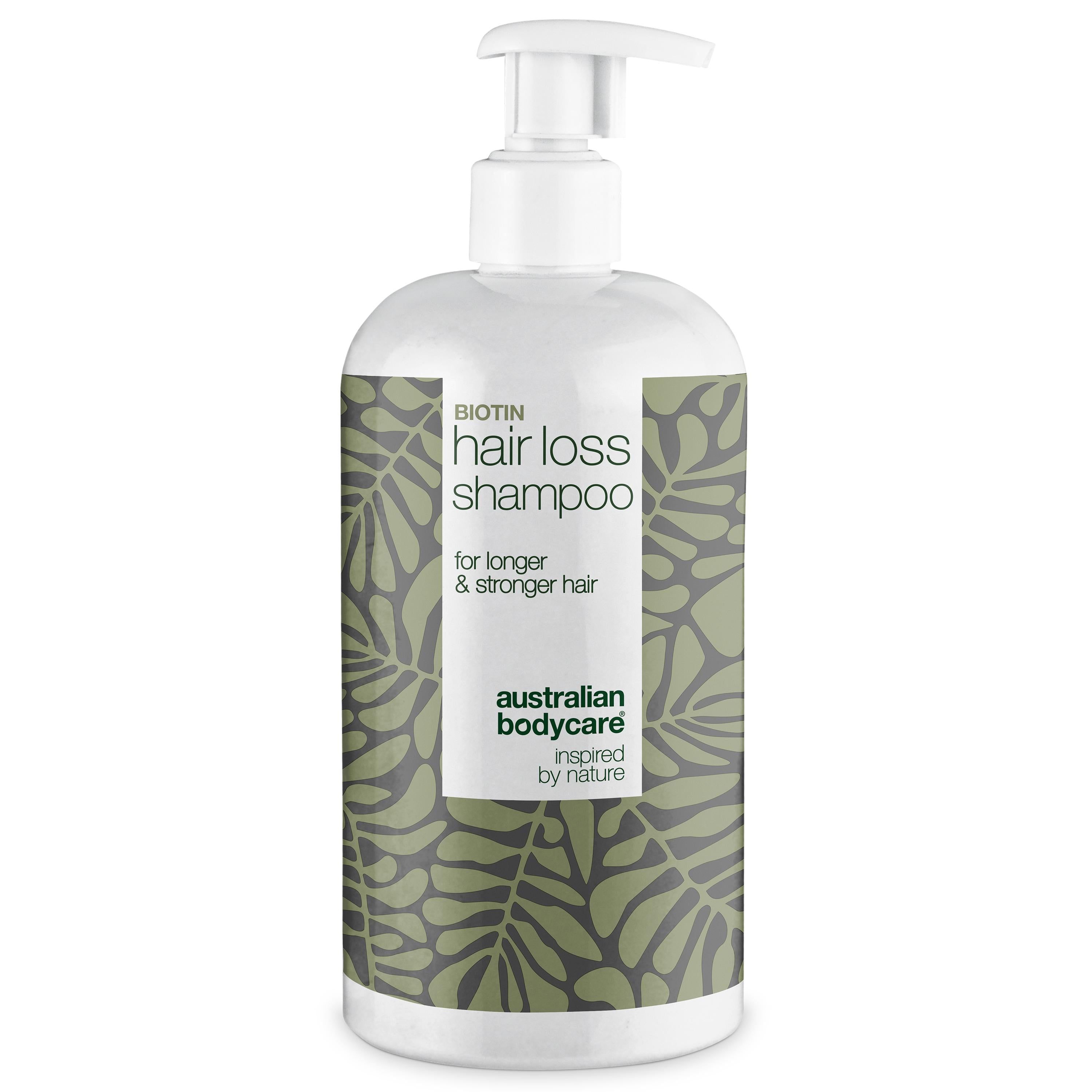 Shampoo-Flasche mit Pumpe. Aufschrift: Hair Loss Shampoo. Grün-weißes Design mit Blättern.