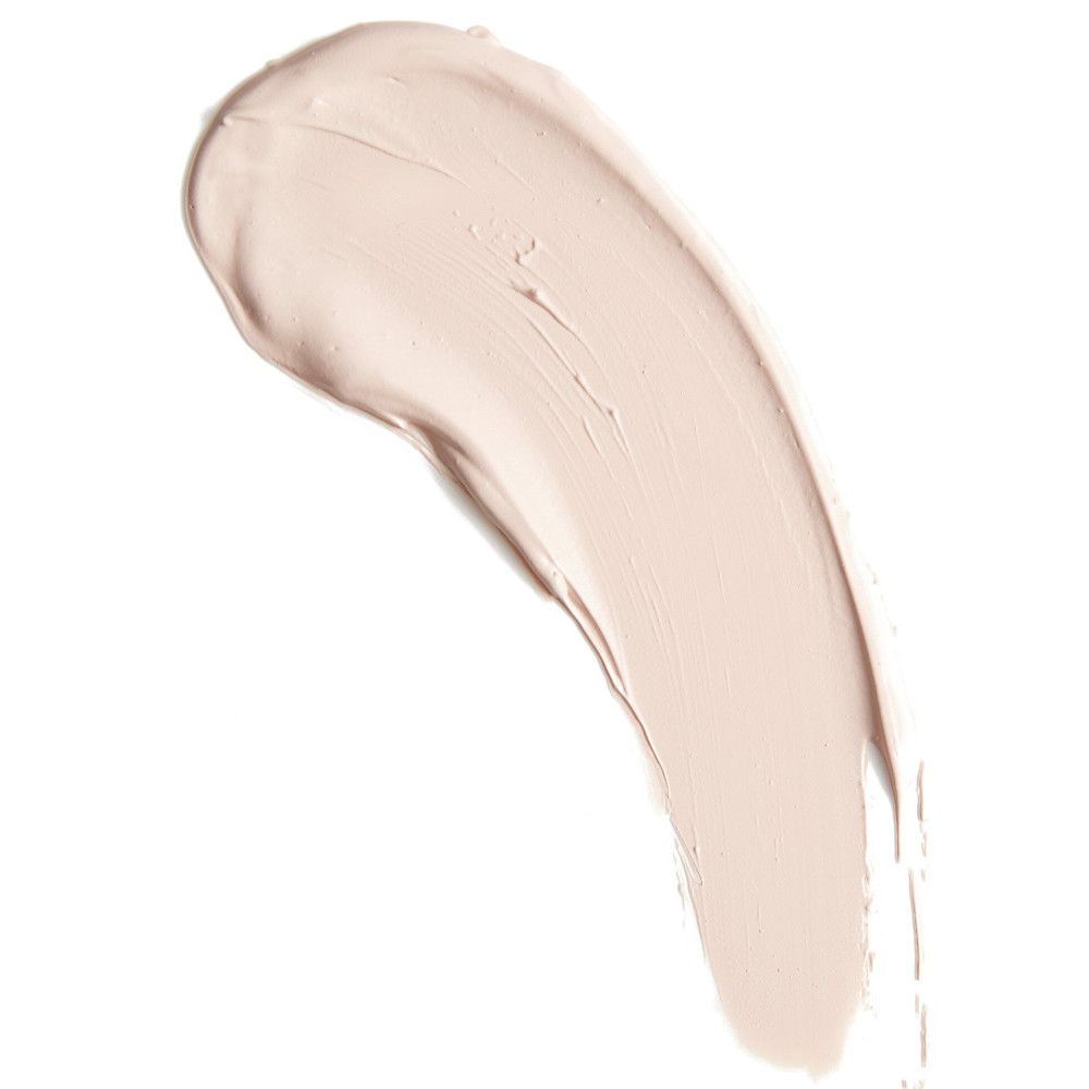 Heller Concealer-Abstrich. Cremige Textur. Auf hellem Hintergrund.
