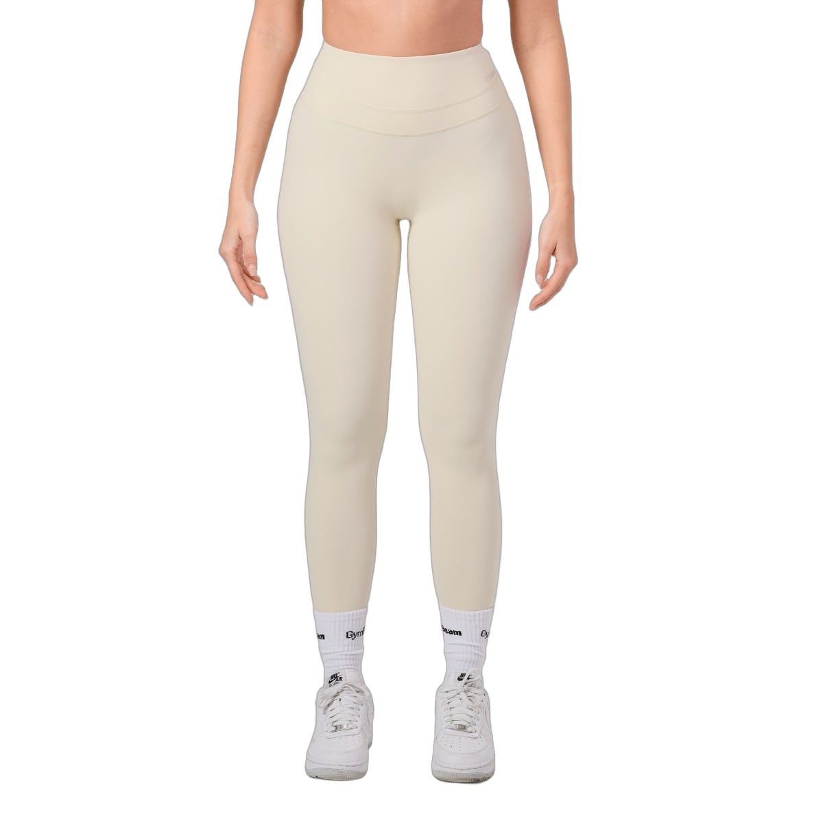 Damen-Leggings in hellem Beige, hohe Taille, nahtlos, von vorne gezeigt.